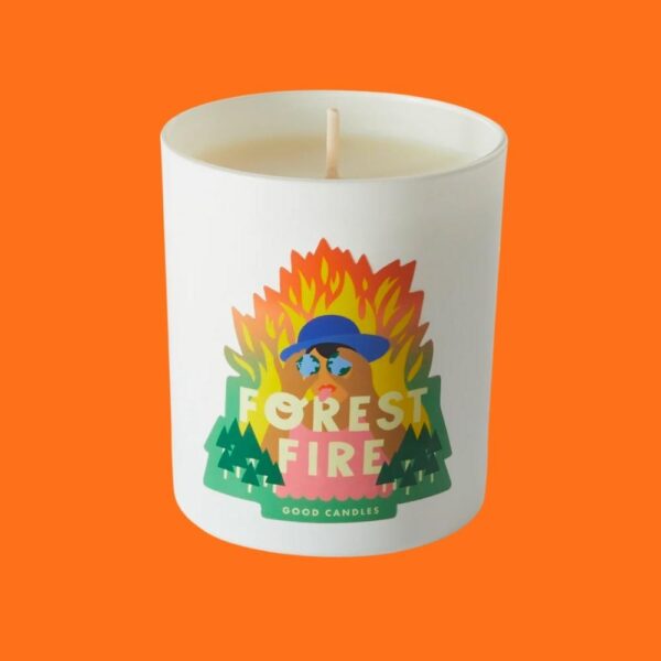 Forest Fires scented candle in white jar with flame illustration on an orange background