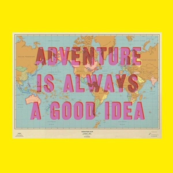 a scratch off map of the world with bold pink text saying adventure is always a good idea on a yellow backdrop