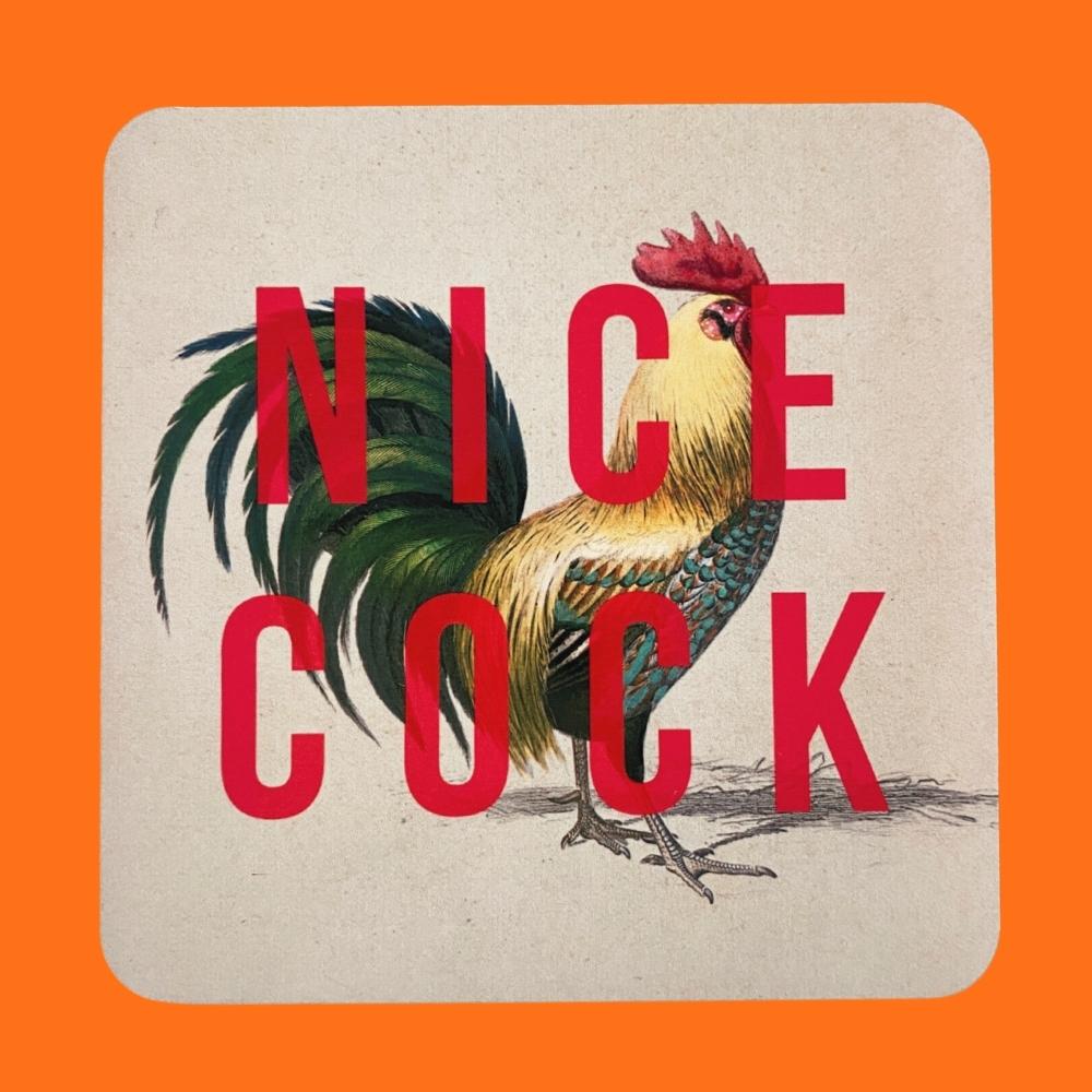 white coaster with a print of a cockerel and red text that says nice cock