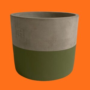 concrete indoor plant pot with green stripe band on orange background