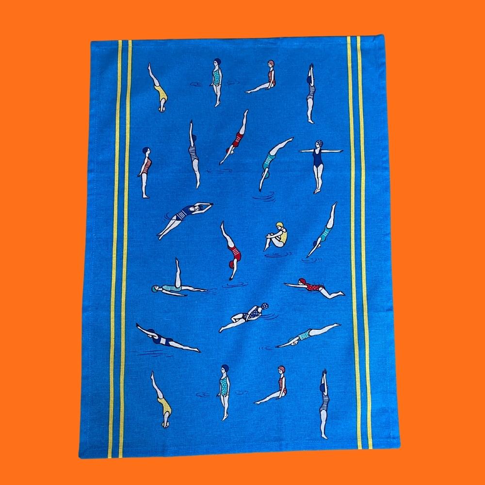 Blue tea towel dish cloth with multicoloured retro synchronized swimmer print