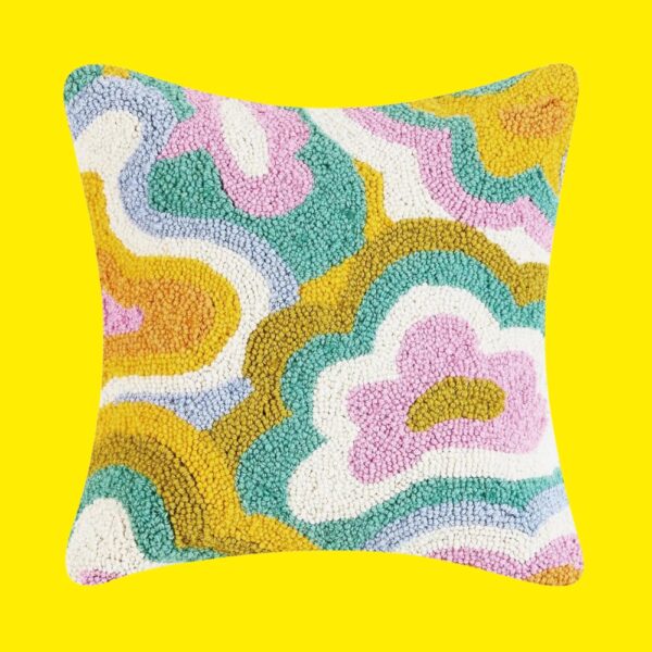 colour psychedelic retro flower power swirl pattern cushion on a yellow background